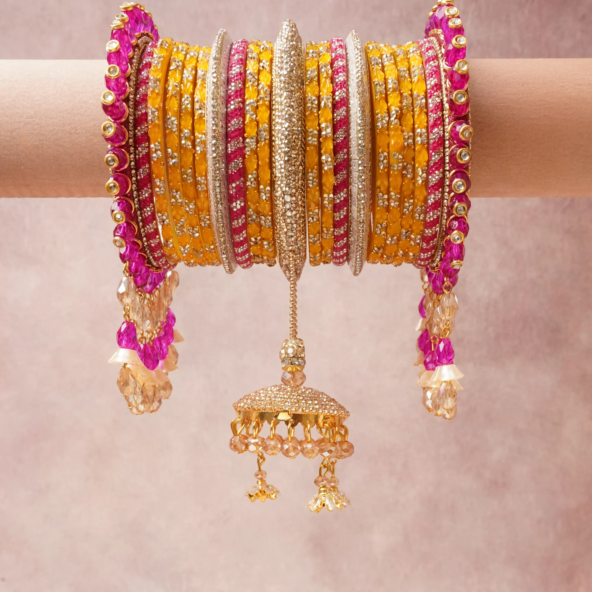 A commanding Golden Yellow anchors this beautiful set, enriched with accents of Pink that add depth and dimension.

Featuring a striking composition of Lacquered Glass, Metal Alloy, Crystal, Faux Pearl, this set carries intricate craftsmanship and strong presence. Grand in form, it is created for moments that deserve to be marked.